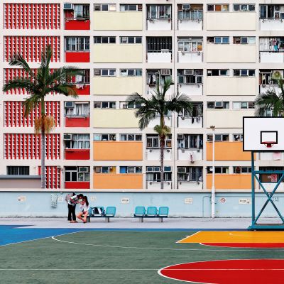 Crowded narrow apartments in the building of Choi Hung public housing estate in Kowloon, Hong Kong, with a basketball stand, Asia