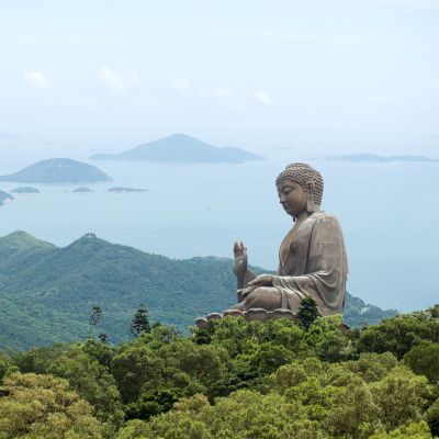 Hong Kong, Lantau Island Giant Buddha of Po Lin Monastery with blue sky, Asia