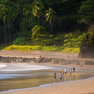 Jaco Beach, Costa Rica. People enjoying the excellent tropical climate