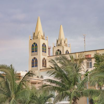 Beach and church building at malecon in La Libertad, a coastal city located in Ecuador, South America