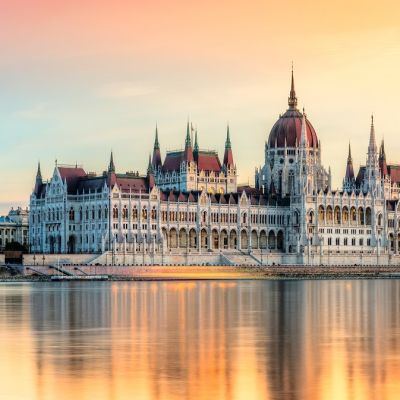 Enchanting Travels European Capitals ToursView of Budapest parliament at sunset, Hungary European Cities tours