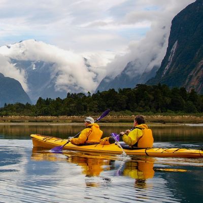 Enchanting Travels New Zealand Tours sea kayak in Milford Sound, New Zealand