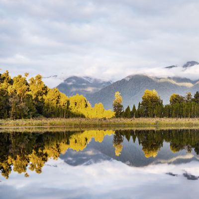 Enchanting Travels New Zealand Tours Lake Brunner and mountains
