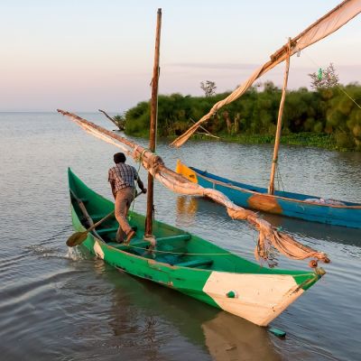 Enchanting Travels Uganda Tours Bulago Island Lake victoria fishermen go to work - culture of Uganda