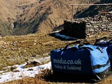 Campsite with kitbags amd peaks, Kopra Ridge, Himalaya