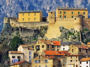 traditional villages with mountain backdrop