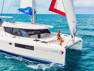 guest-sitting-on-sunsail-yacht-while-cruising-2400x1350-web-1