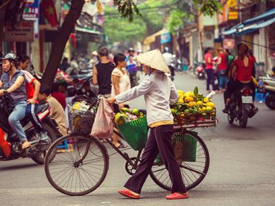 Vietnamese Street Crossing - i Tour Vietnam Travel Guides