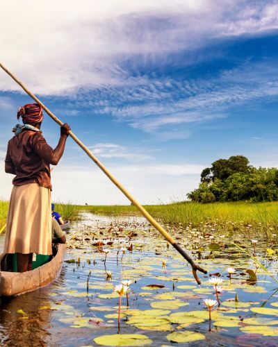 dugout-canoe-through-okavango-delta-botswana