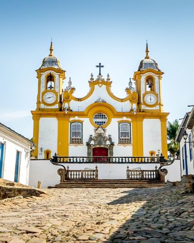 Colorful colonial houses and church in city of Tiradentes