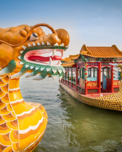 Enchanting Travels China Tours Dragon boat on the Kunming Lake, Beijing, China