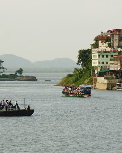 Enchanting Travels India Tours East India Guwahati city along the River Brahmaputra