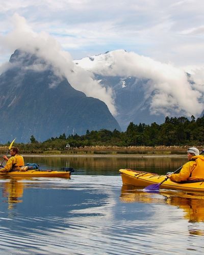 Enchanting Travels New Zealand Tours sea kayak in Milford Sound, New Zealand
