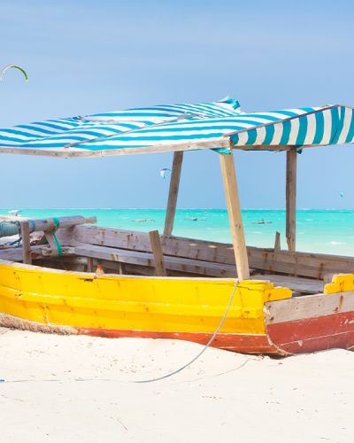 Maasai lounging at the beach - Things to do in Zanzibar