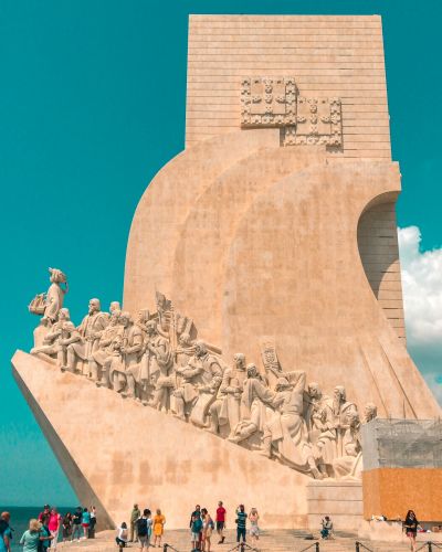 gray-concrete-statues-under-blue-sky-during-daytime