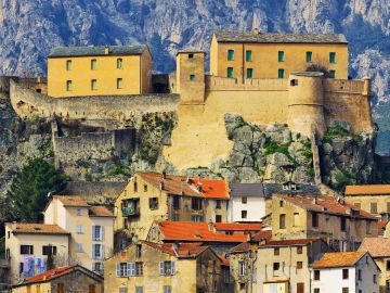 traditional villages with mountain backdrop