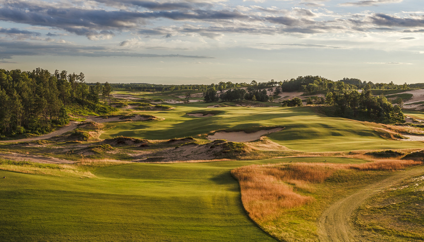 Sand dunes line the left side of the 10th hole on the Sand Valley Course at Sand Valley Golf Resort in Nekoosa, Wisconsin.