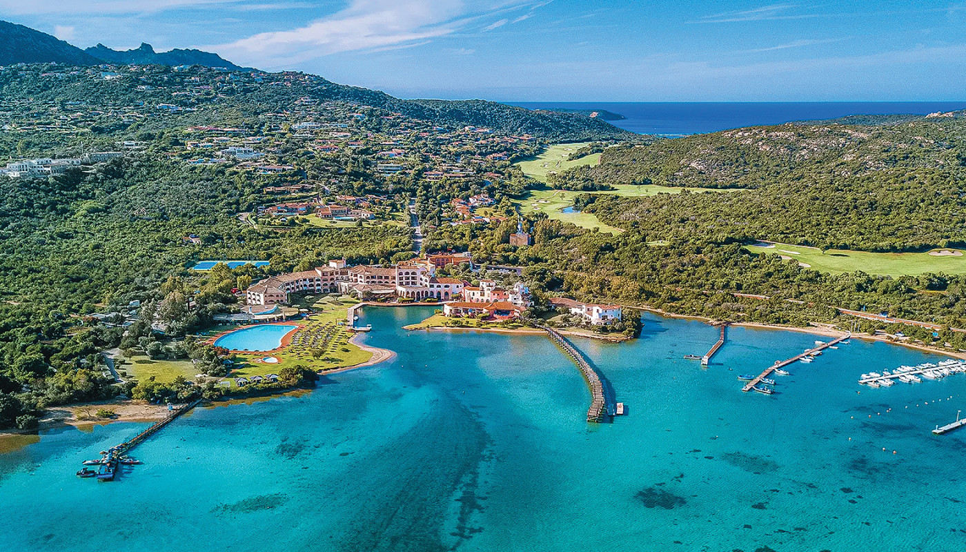 An overhead view of fairways cutting through the countryside at Pevero Golf Club along the Tyrrhenian Sea in Sardinia, Italy.