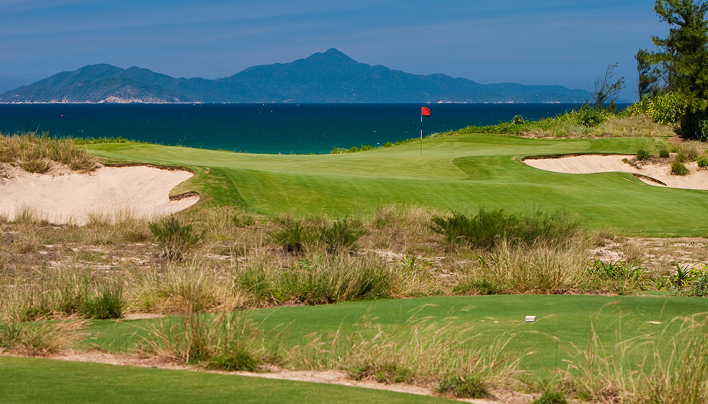 A tee box view of the 16th hole on the Dunes Course at Da Nang Golf Club along the South China Sea in Da Nang, Vietnam.