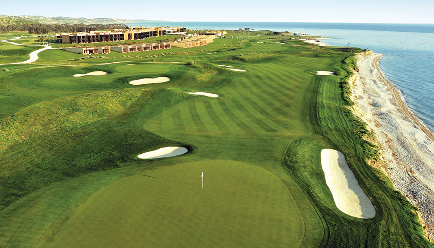 An aerial view of the 18th hole along the shore of the Mediterranean Sea at Verdura Resort’s West Course in Sicily, Italy.