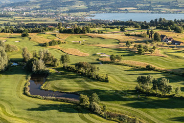 An aerial view of the Lakeside Course winding through the Swiss countryside at Golf Sempachersee in Sempach, Switzerland.