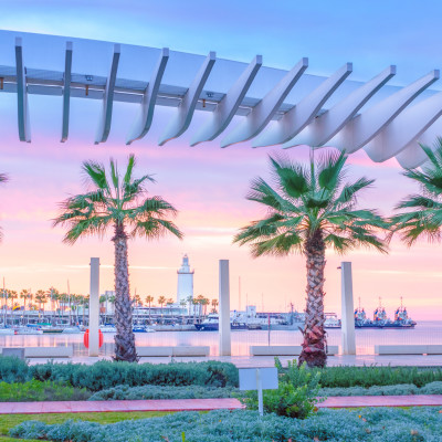 The marine of Malaga, Spain. It is a modern region of the city with museums, restaurants, entertainment, and a ancient lighthouse at the tip.