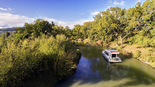 Aerial view of a Liberty boat on the Canal du Midi