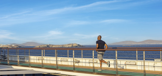Guest running on track on wraparound deck