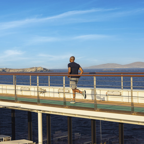 Guest running on track on wraparound deck