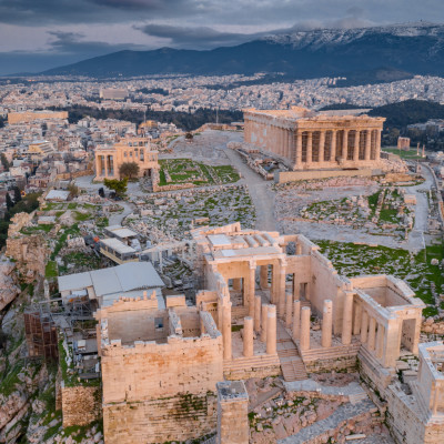 Aerial view of Acropolis of Athens, the Temple of Athena Nike, Parthenon, Hekatompedon Temple, Sanctuary of Zeus Polieus, Odeon of Herodes Atticus, Erechtheion at sunset