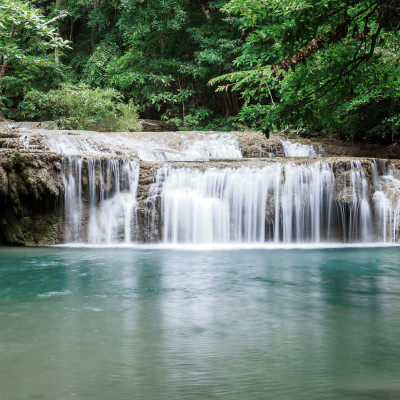Deep forest waterfall at Erawan waterfall National Park Kanjanab, Thailand