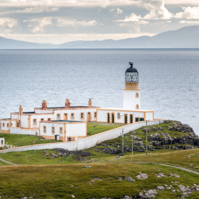 Lighthouse on the cliffs of Neist Point, a famous landmark near Glendale, Isle of Skye, Scotland, Europe