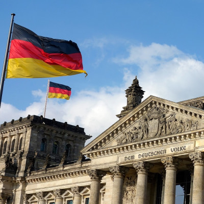 German flag waving at Bundestag building, Berlin, Germany, Europe