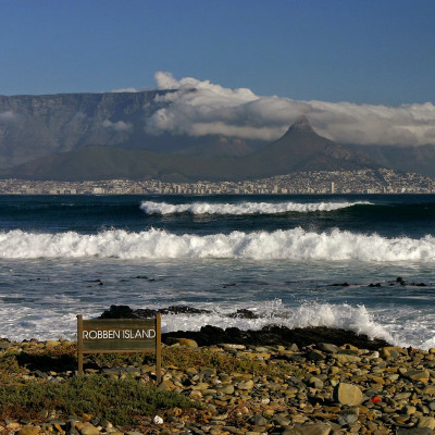 Enchanting Travels South Africa Tours Cape Town and Table mountain seen from the beach of Robben Island - history of South Africa