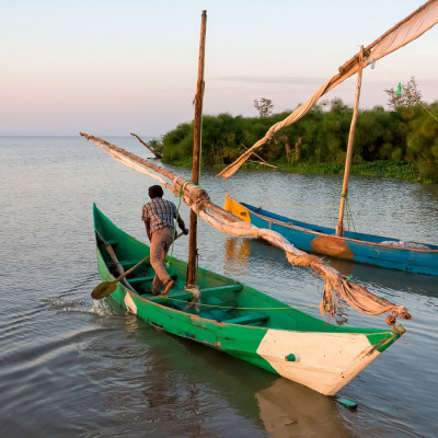 Enchanting Travels Uganda Tours Bulago Island Lake victoria fishermen go to work - culture of Uganda
