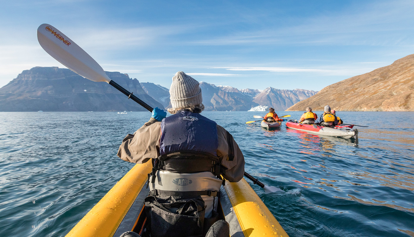 Guests enjoying the paddle excursion in Greenland. Photo by Acacia Johnson.