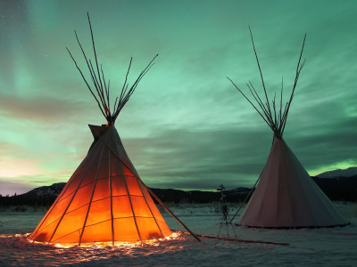 Indian Tipies under the northern lights in Whitehorse, Yukon
