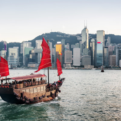 Scenic view of traditional Chinese wooden sailing ship with red sails, Hong Kong Islands, Asia