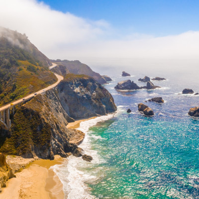 Arial view of the California Bixby bridge in Big Sur in the Monterey County along side State Route 1 US, the ocean road.