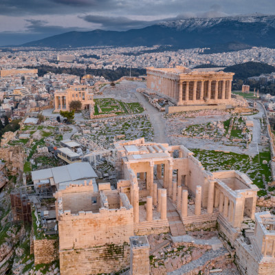 Aerial view of Acropolis of Athens, the Temple of Athena Nike, Parthenon, Hekatompedon Temple, Sanctuary of Zeus Polieus, Odeon of Herodes Atticus, Erechtheion at sunset