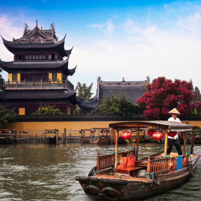 China traditional tourist boats at Shanghai Zhujiajiao town with boat and historic buildings, Shanghai China