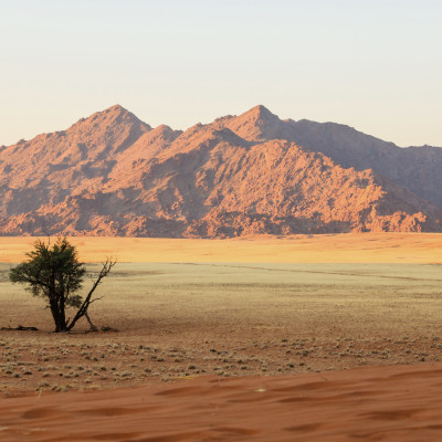 Red sand dunes and granite outcrops in Sesriem, Namibia, Africa