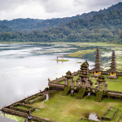 Aerial view of hindu temple ruins of Pura Hulun Danu at the Tamblingan lake, Bali, Indonesia, Asia