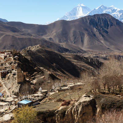 Asian mountain village and terrace fields in autumn in Lower Mustang, Nepal, Himalaya, Annapurna Conservation Area