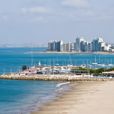 Salinas beach with apartment buildings and yacht club in Ecuador, Pacific Coast, South America