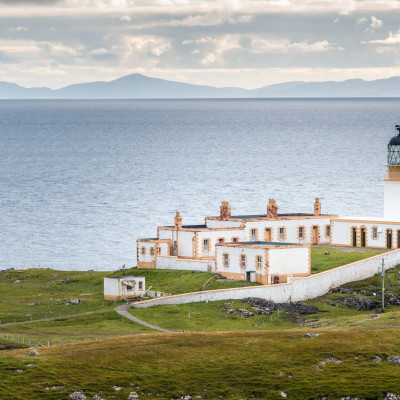 Lighthouse on the cliffs of Neist Point, a famous landmark near Glendale, Isle of Skye, Scotland, Europe
