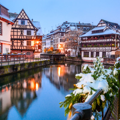 Enchanting Travels France Tours Strasbourg, France. Christmas Market in Petite France old district of Strasbourg in Alsace