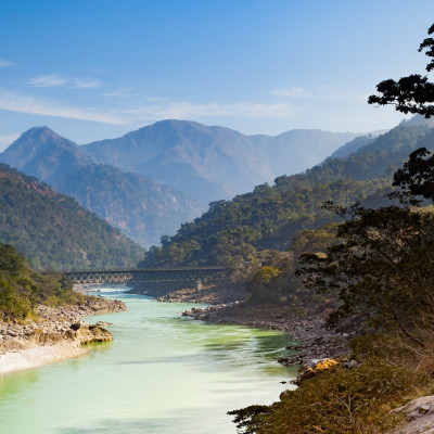 Enchanting Travels India Tours Scenic view at Ganges River in Rishikesh, Uttarakhand, India