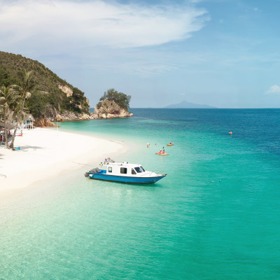 Beautiful beach panorama view over a Rawa island. White sandy beach seen from above. Malaysia, Asia