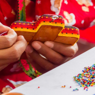 Enchanting Travels Working hands on traditional handcraft from the south of Mexico